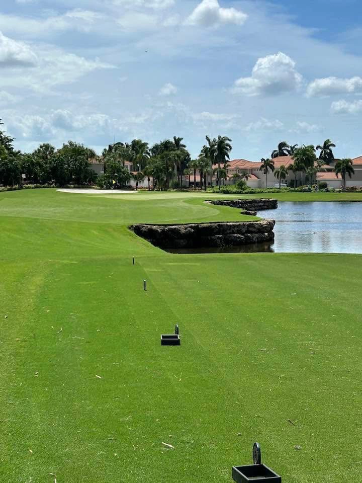 view from a tee box with water on the right